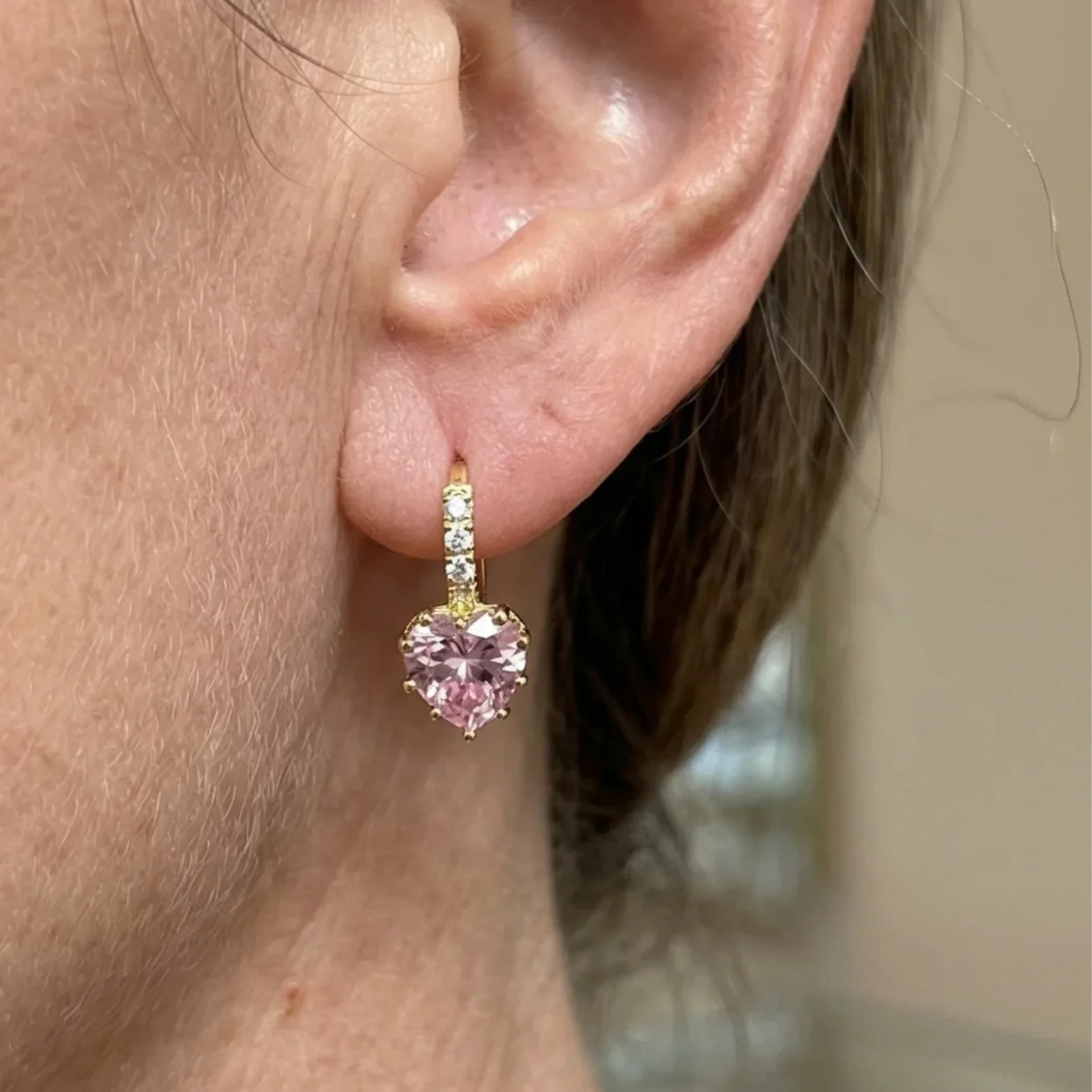 Cupid Glow Huggie Earrings | Gold - Image 2